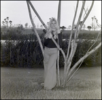 Woman Posing with Tree, B by Skip Gandy