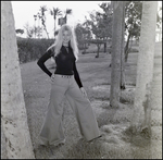 Woman Posing Near Trees, A by Skip Gandy