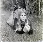 Woman Laying on Grass by Skip Gandy