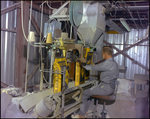 Worker at the W.R. Bonsal Company Packaging Division, A by Skip Gandy