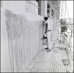 Worker Painting Building, A by Skip Gandy