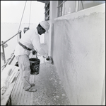 Worker Painting Building, B by Skip Gandy