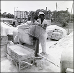 Worker Handling Concrete, F by Skip Gandy