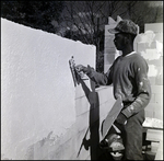 Applying Cement onto Brick Structure, C by Skip Gandy