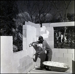 Applying Cement onto Brick Structure, F by Skip Gandy