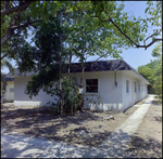 Building Surrounded by Trees and Sidewalks, L by Skip Gandy