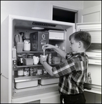 Boy Using Boxed Milk, C