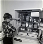 Boy Using Boxed Milk, E