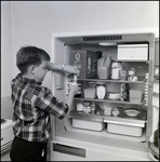 Boy Using Boxed Milk, G