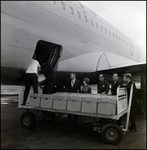 Loading an Airplane with Boxes, D by Skip Gandy