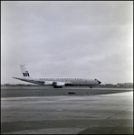 Braniff International Airplane on Runway, A by Skip Gandy