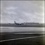 Braniff International Airplane on Runway, B by Skip Gandy