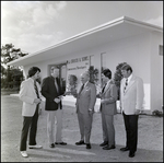 Businessmen in Front of Office Building, B by Skip Gandy