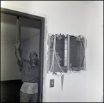 Man Measures Door Header by George Skip Gandy IV