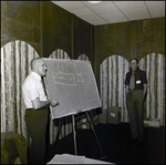 Paul Rice and Gene Holland at a Chalkboard, Tampa, Florida, A by George Skip Gandy IV