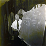 Paul Rice at a Chalkboard, Tampa, Florida by George Skip Gandy IV