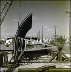 Crane Lifts Curved Steel Tunnel Piece, Tampa, Florida, A by George Skip Gandy IV