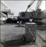 Crane Working in Front of a Building, Tampa, Florida, F by George Skip Gandy IV