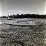 Trucks near Standing Water at a Cone Brothers Construction Site, Tampa, Florida by George Skip Gandy IV