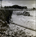 Grader near Piping at a Cone Brothers Construction Site, Tampa, Florida, B by George Skip Gandy IV