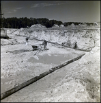 Pipelayers Work at a Cone Brothers Construction Site, Tampa, Florida by George Skip Gandy IV