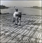 Workers on a Rebar Grid for a Bridge, Tampa, Florida, B by George Skip Gandy IV