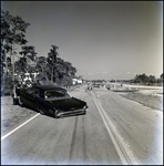 Car Being Towed from US Highway 41, Tampa, Florida, A by George Skip Gandy IV