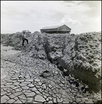 Man Climbs Pile of Dirt, Tampa, Florida, B by George Skip Gandy IV