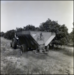 Fertilizer Spreader in Orange Grove, Tampa, Florida, B by George Skip Gandy IV