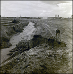 Man Surveys Mudslide at Cone Brothers Construction Site, Tampa, Florida, A by George Skip Gandy IV