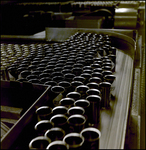 Empty Coca Cola Cans in Production, Tampa, Florida, A by George Skip Gandy IV