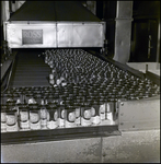 Empty Ritz Orange Soda Cans in Production, Tampa, Florida by George Skip Gandy IV