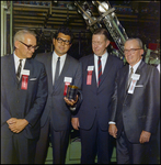 W.M. Neuman, Armand Zazueta, R.S. Hatfield, and Charles Campbell at a Continental Can Company Production Plant, Tampa, Florida by George Skip Gandy IV