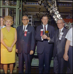 W.M. Neuman, R.S. Hatfield, Charles Campbell, and a Woman at a Continental Can Company Production Plant, Tampa, Florida by George Skip Gandy IV