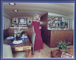 Woman in Red Dress Standing in Boat Interior, B by George Skip Gandy IV