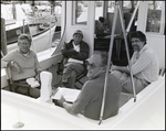 Group of Men in Boat Cockpit, A by George Skip Gandy IV