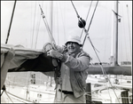 A Man Standing on Sailboat by George Skip Gandy IV