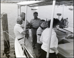 Group of People in Boat Cockpit by George Skip Gandy IV