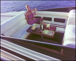 Woman in Pink Dress Sitting in Boat Cockpit by George Skip Gandy IV