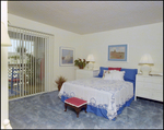 Bedroom with Blue Carpet and Blue Bedspread, A by George Skip Gandy IV