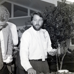 Bearded Man with Carnation Getting Food at a Party by George Skip Gandy IV