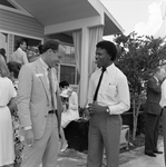 Two Men Smiling at a Party by George Skip Gandy IV