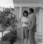 Woman and Man Talking on the Porch by George Skip Gandy IV