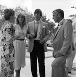 Group of Men and Women Talking at a Party by George Skip Gandy IV