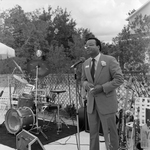 Man Speaking Onstage at a Party, A by George Skip Gandy IV