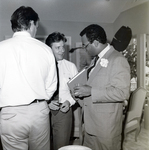 Three Men Talking at a Party by George Skip Gandy IV