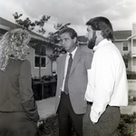 Two Men Conversing with a Woman by George Skip Gandy IV