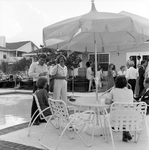 People Chatting by the Pool by George Skip Gandy IV