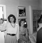 Two Women Pose Holding a Vintage Vivitar Tele-835 AW Point Camera by George Skip Gandy IV