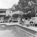 People Sitting by the Pool by George Skip Gandy IV